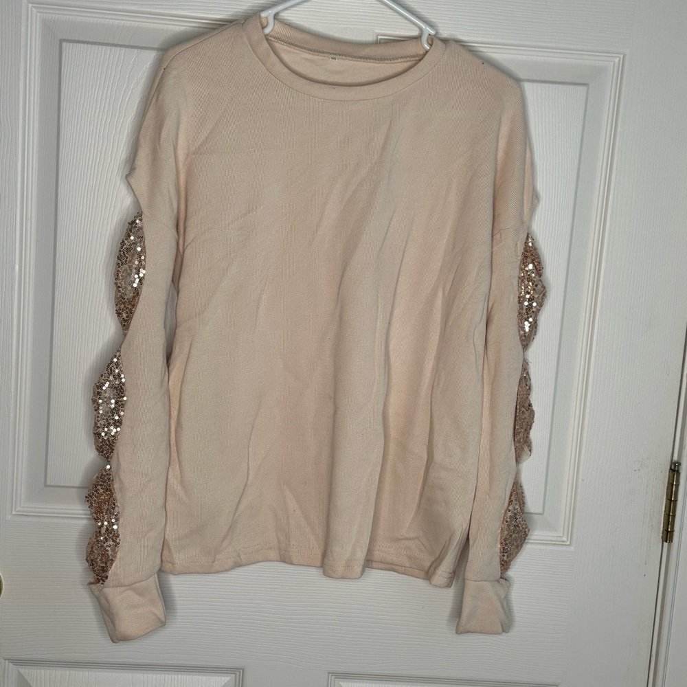 Sweater with cut out sleeves